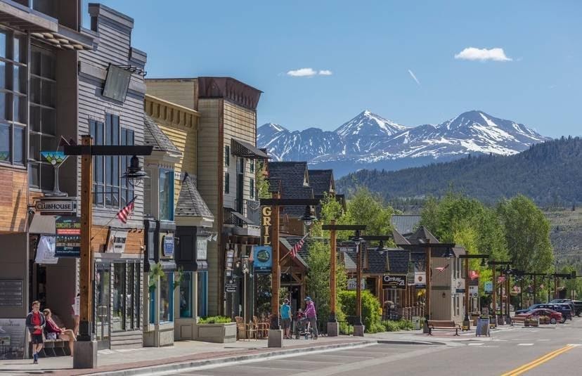 A street in the summer with beautiful facades and passersby; KODI Rafting offers leisure time too!