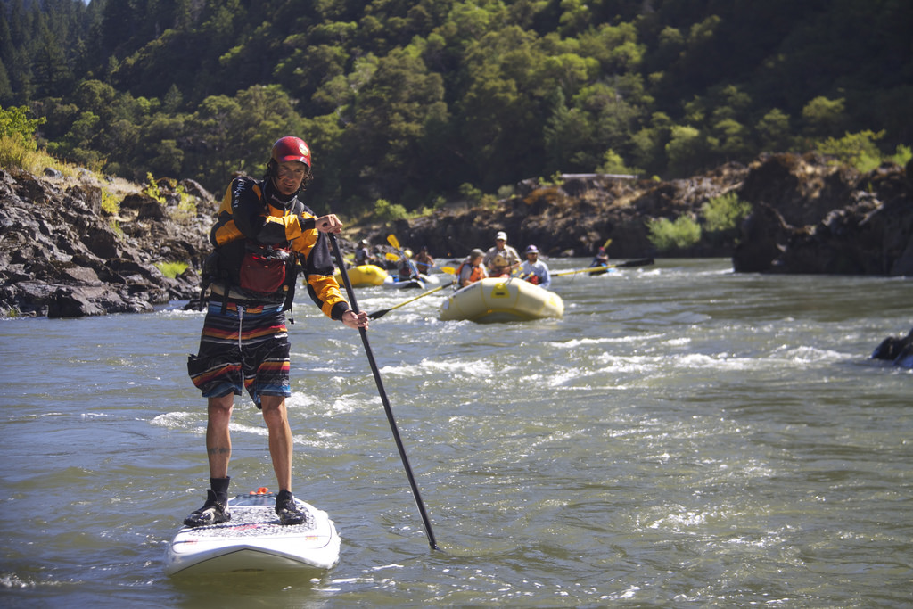 A single person engaged in class 3 whitewater rafting